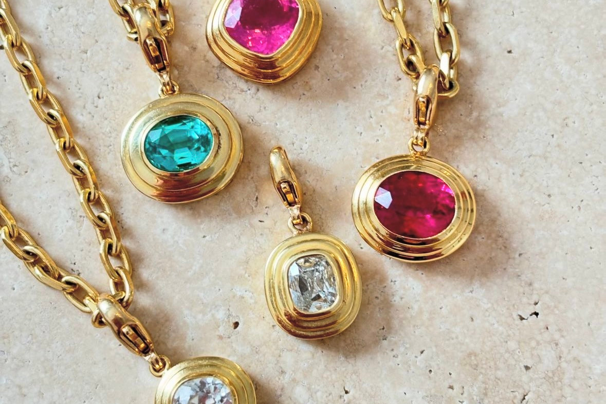 Cassandra Goad international women day jewellery bright pink sapphires, blue tourmalines, topaz and diamond gemstones necklaces