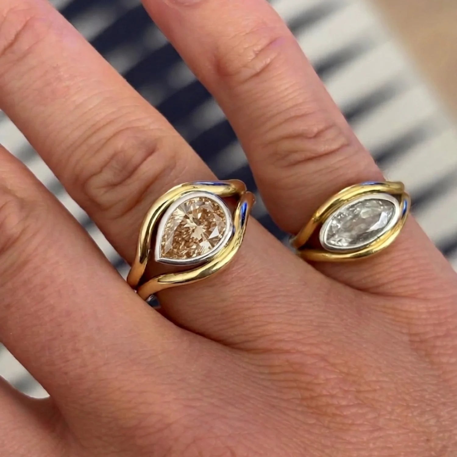 Close-up of Atlantis 2.02ct Brown Diamond Mermaid Ring in yellow and white gold with 2.02ct pear-shaped lab-grown brown diamond on mermaid tail-inspired band