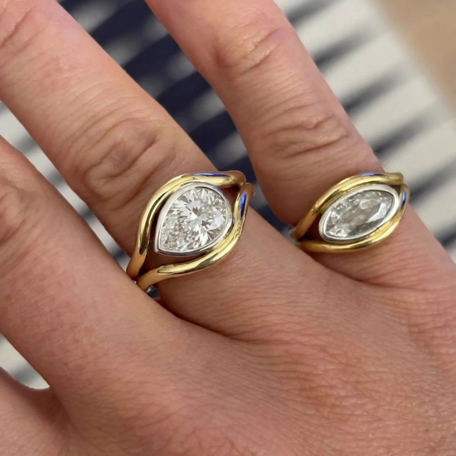 Close-up of Atlantis 2.02ct Diamond Mermaid Ring in yellow and white gold with 2.02ct pear-shaped lab-grown white diamond on mermaid tail-inspired band