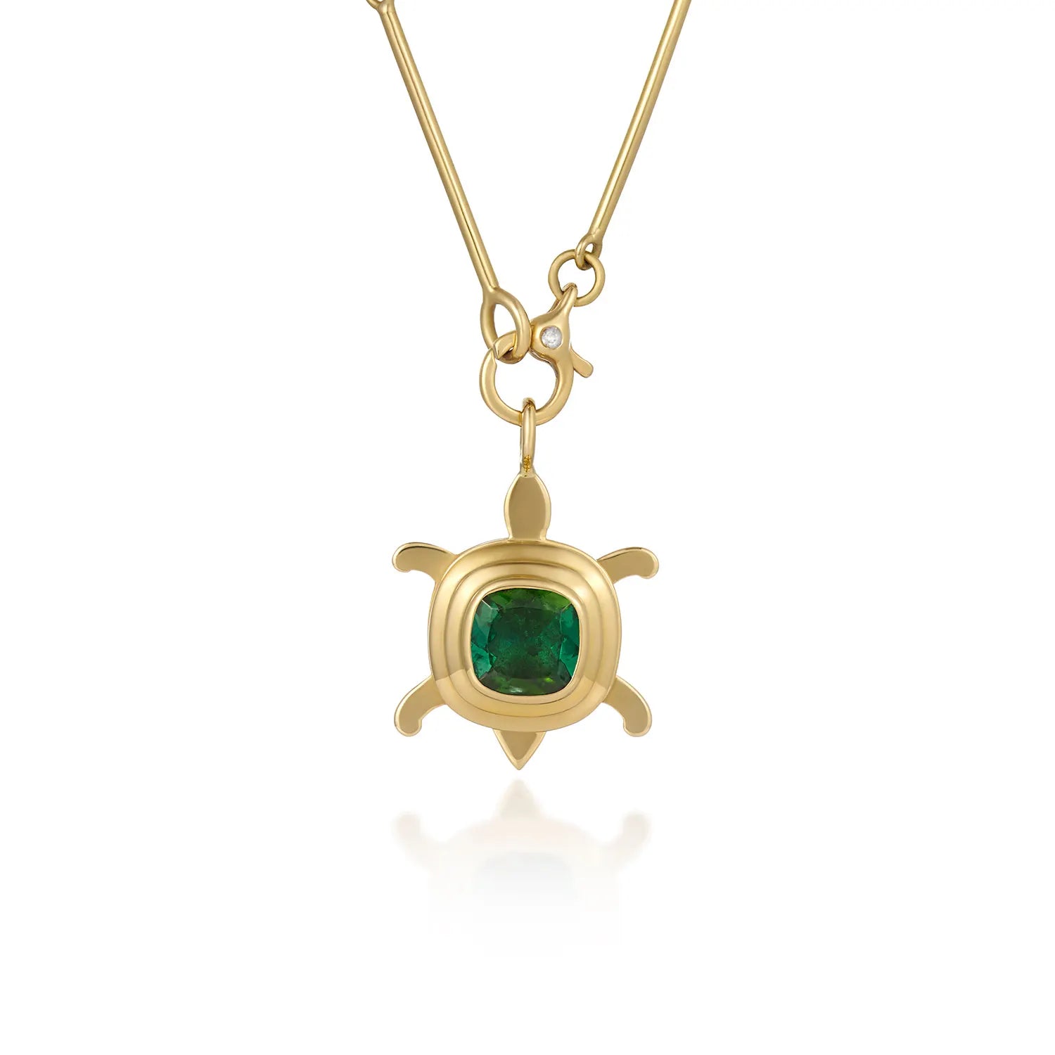 Atlantis dancing turtle tourmaline charm in solid 18k yellow gold worn on a cord or gold chain