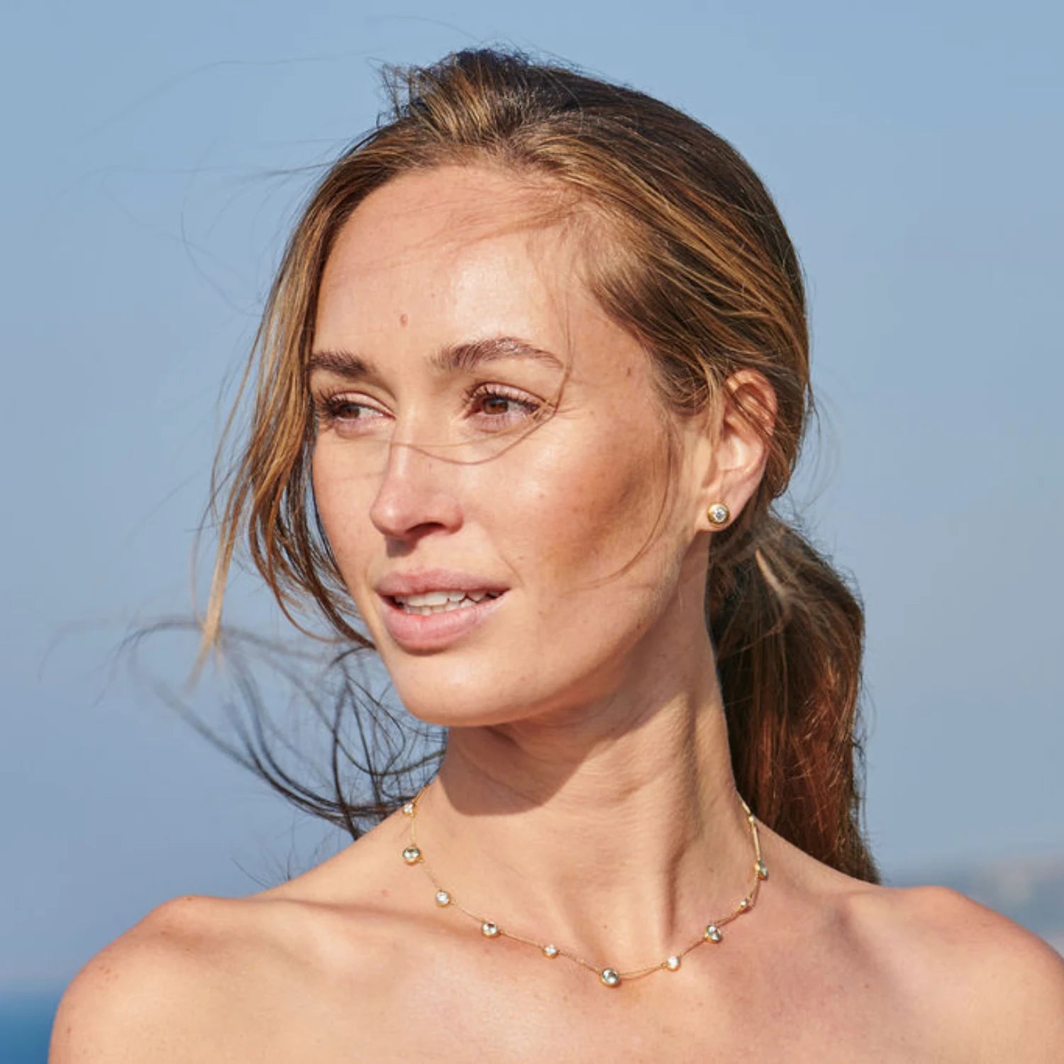 Model wearing Minka Jewels Atlantis Diamond and Tourmaline Necklace styled with diamond stud earrings