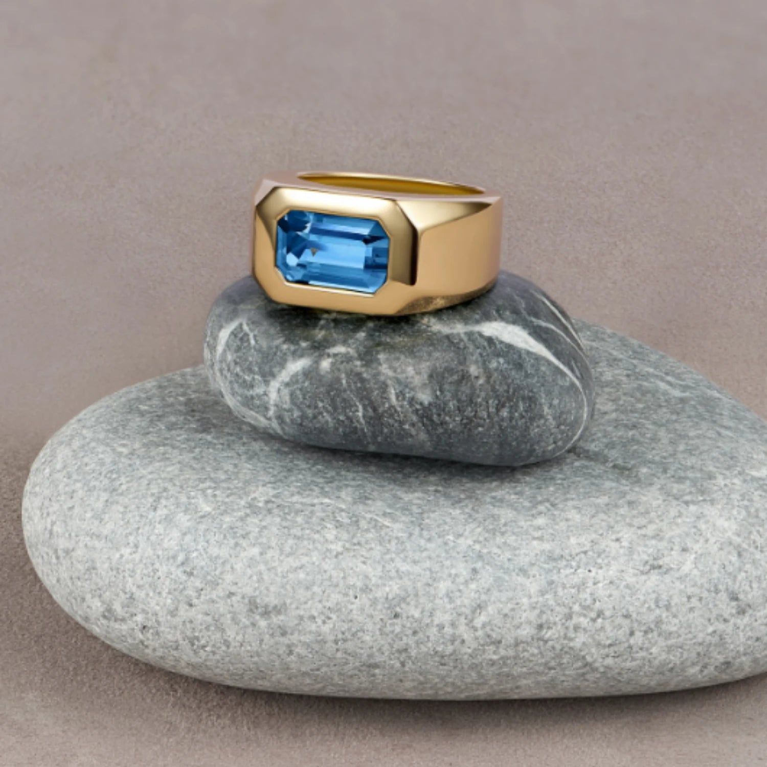 Close-up of Berlin Cocktail Ring showing 2.75ct octagonal-cut blue indicolite tourmaline on 18k gold band.