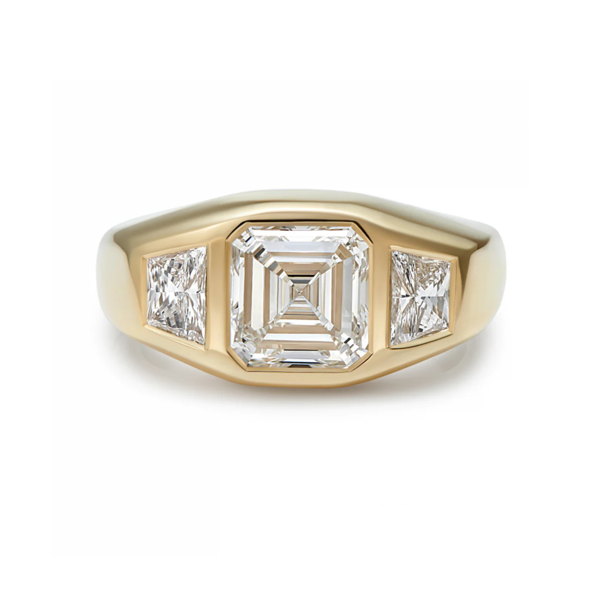 Bridal engagement ring in 18k yellow gold featuring a 2ct octagon-cut (Asscher) diamond flanked by 0.50ct trapezoid diamonds