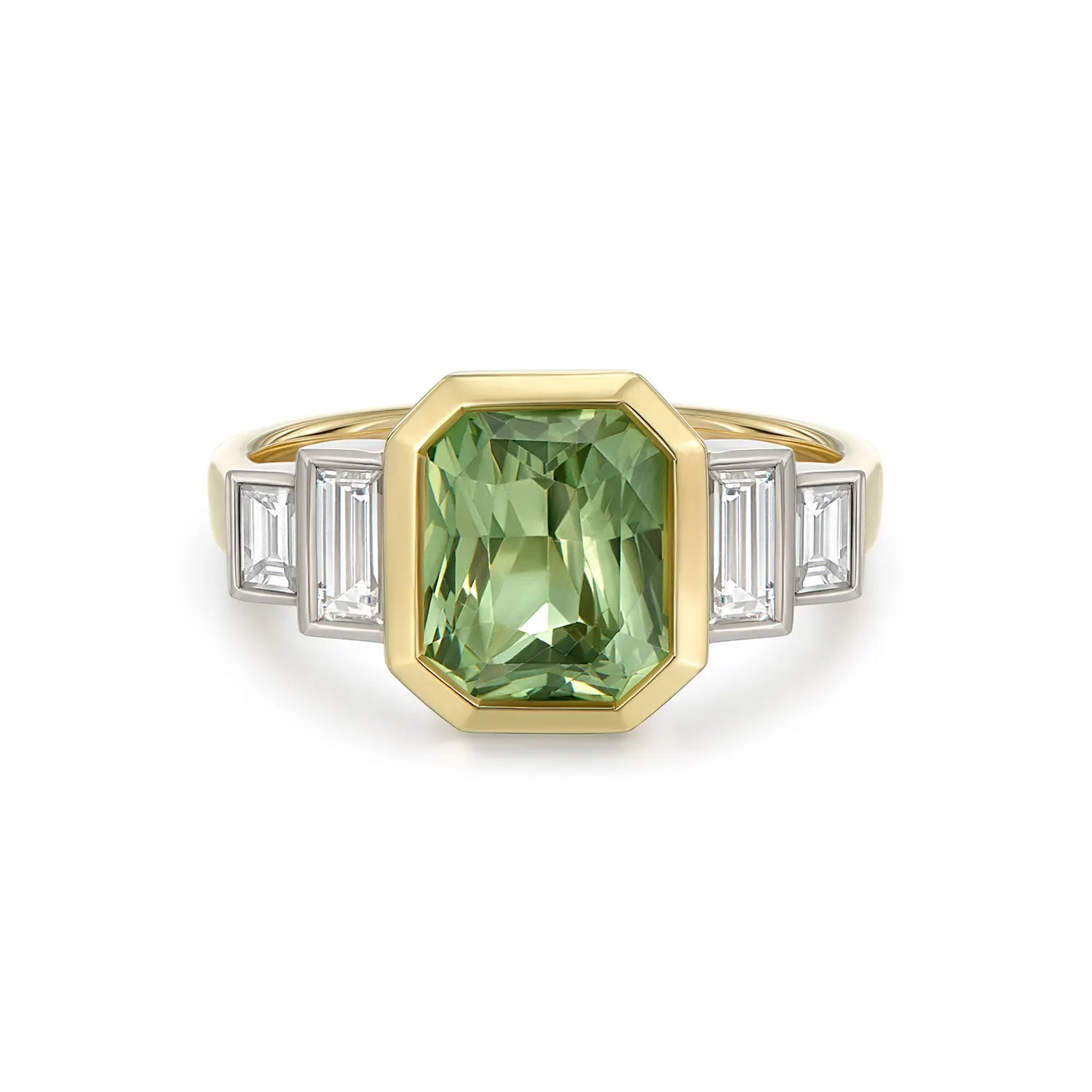 Green sapphire emerald-cut ring in 18k yellow gold featuring deep green sapphire with baguette-cut white diamond accents