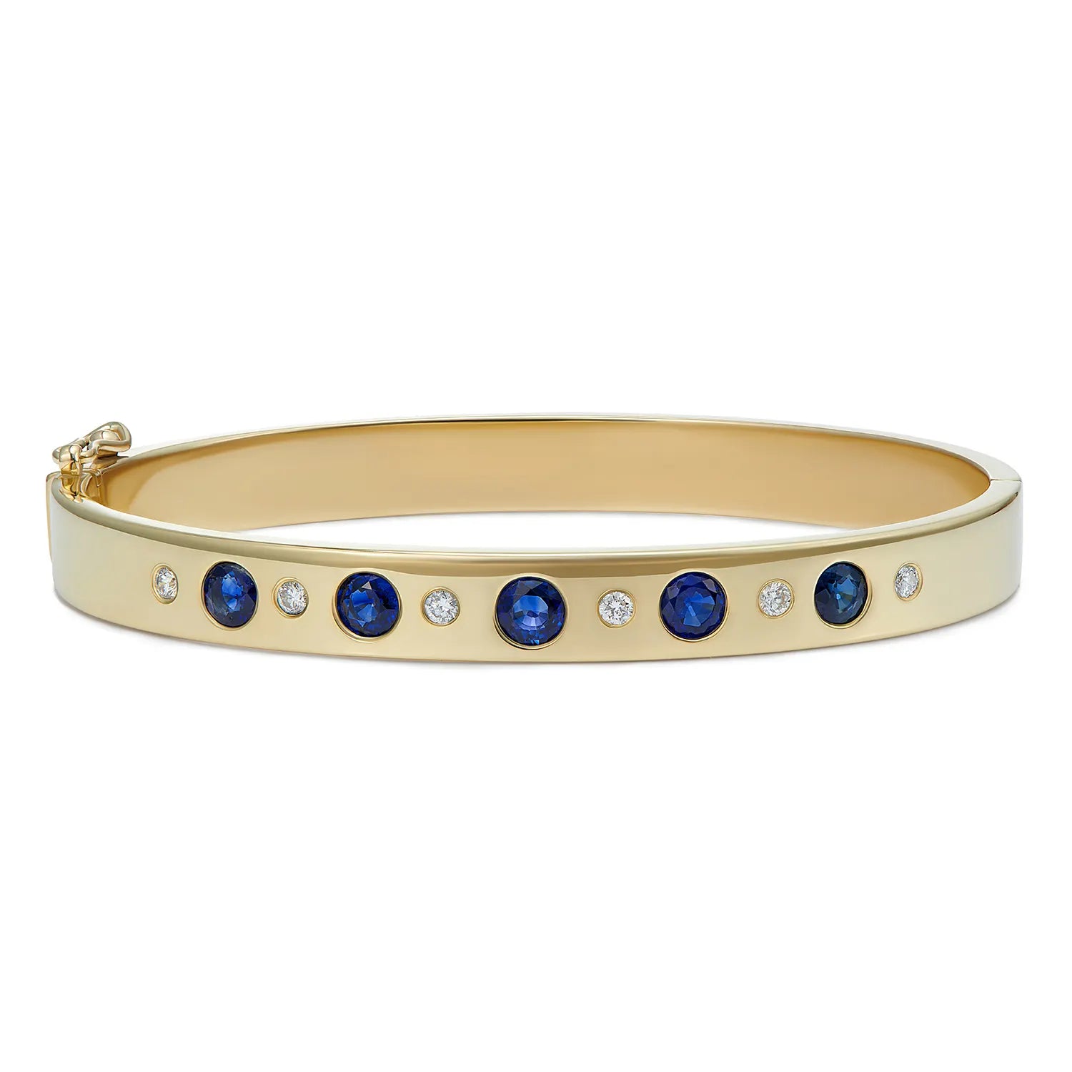 Sapphire and diamond bracelet in 18k yellow gold featuring five round blue sapphires and five brilliant-cut white diamonds in hinged bangle design