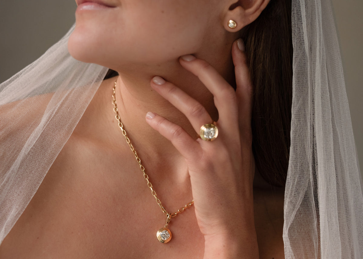 Whitelaw Gold Old cut Diamond Necklace and Engagement rings