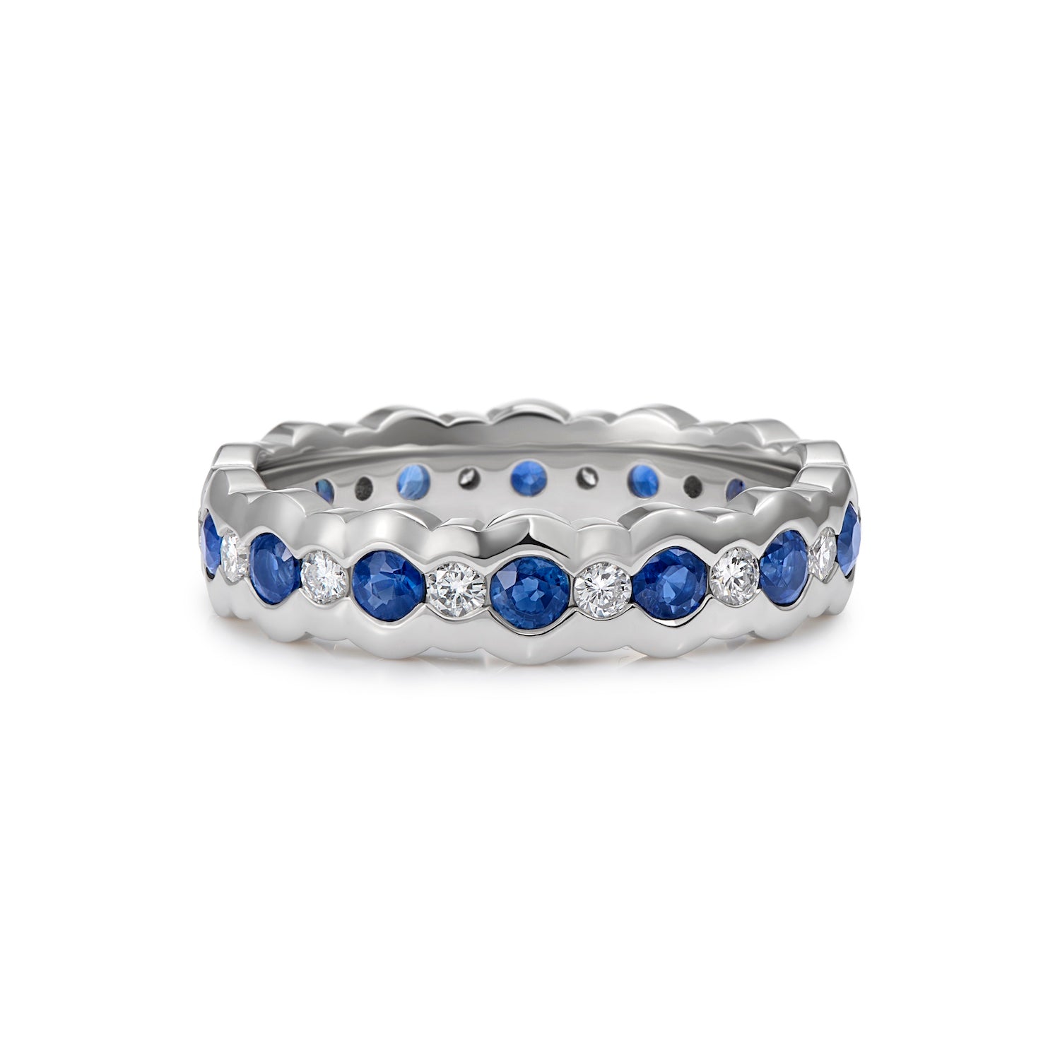 Platinum wavy eternity ring with blue sapphires and white diamonds by Minka Jewels