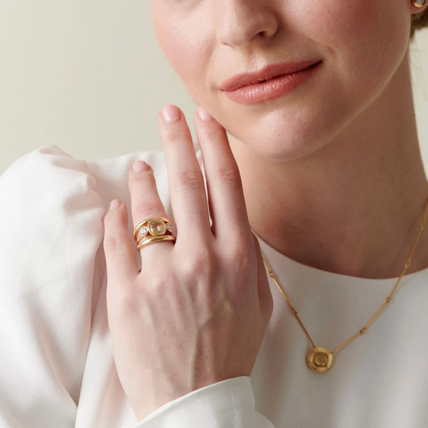 Model wearing Les Trois Vallées yellow sapphire and diamond ring in 18k yellow gold with 3.08ct cushion-cut no-heat Sri Lankan yellow sapphire and 0.50ct diamonds