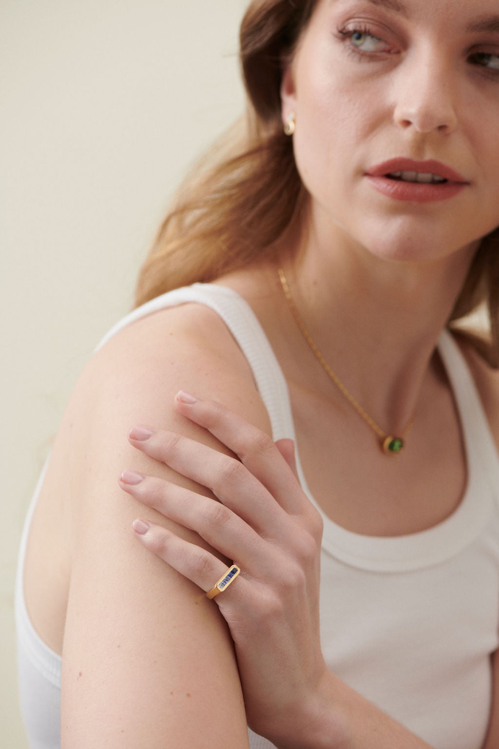 Model wearing the Ley Line Blue Sapphire Ombré Ring stacked with athena tourmaline necklace by Minka Jewels