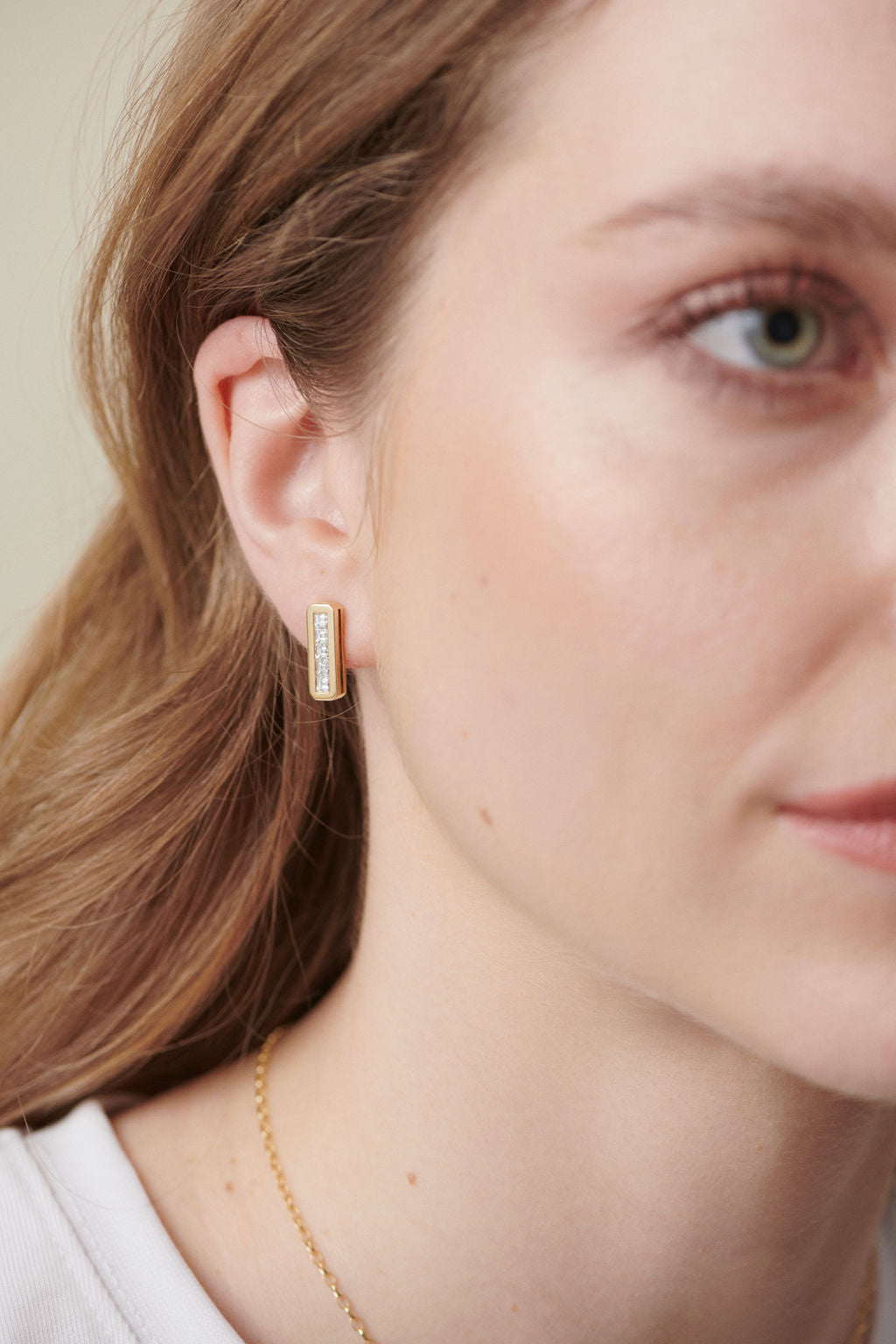 Model wearing Minka Jewels Ley Line Glastonbury Set Diamond Earrings with brushed gold finish