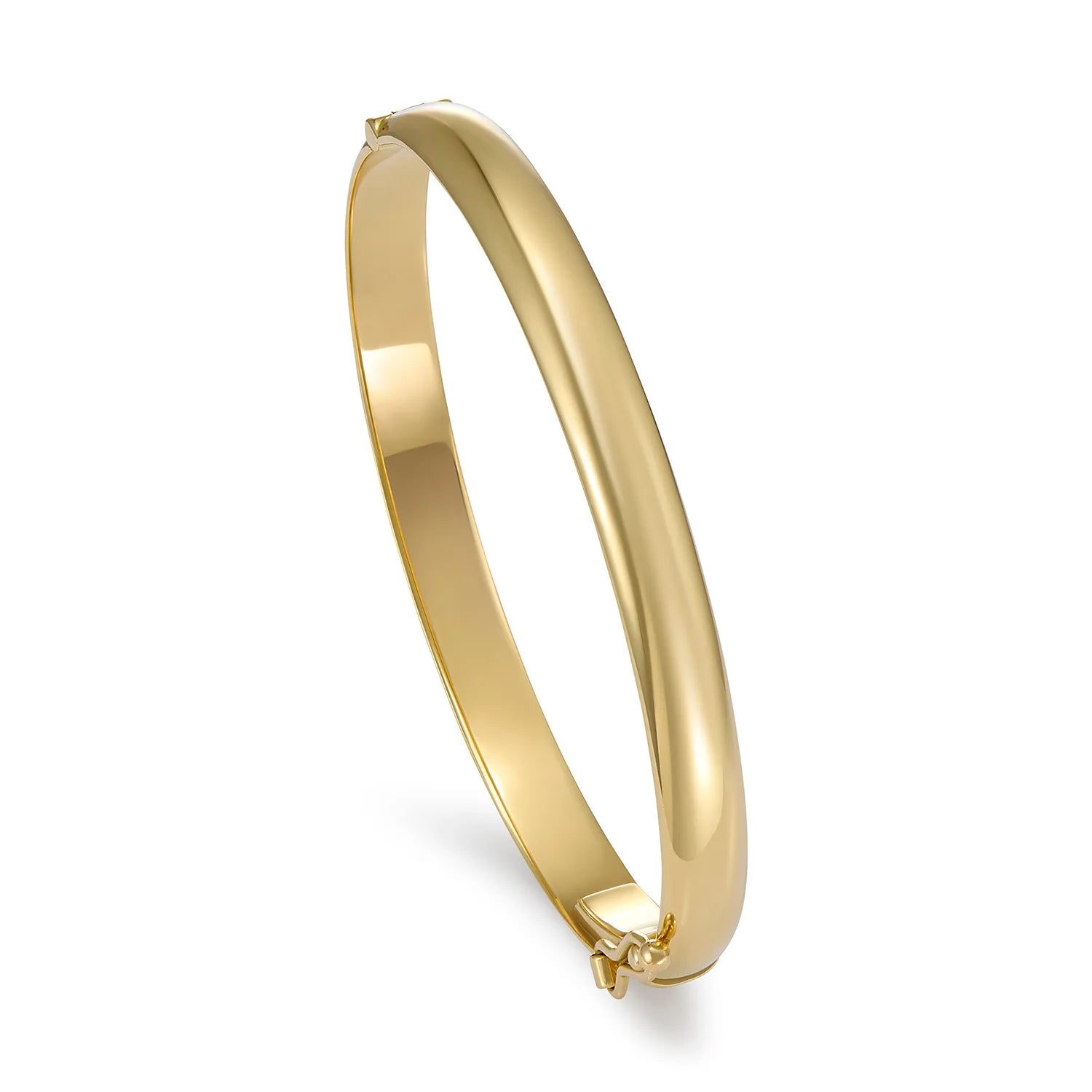 Side view of Ley Lines solid gold bangle bracelet highlighting clean lines and smooth 18k yellow gold finish