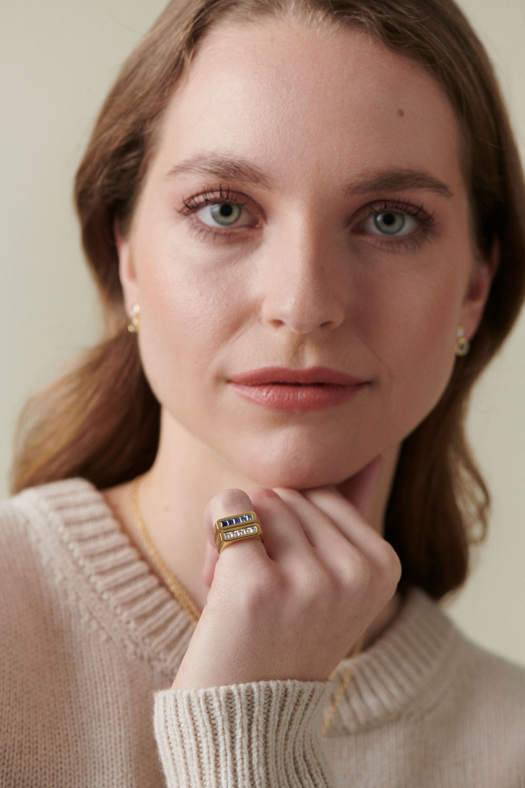 Cassandra Goad blue sapphire and diamond gold rings