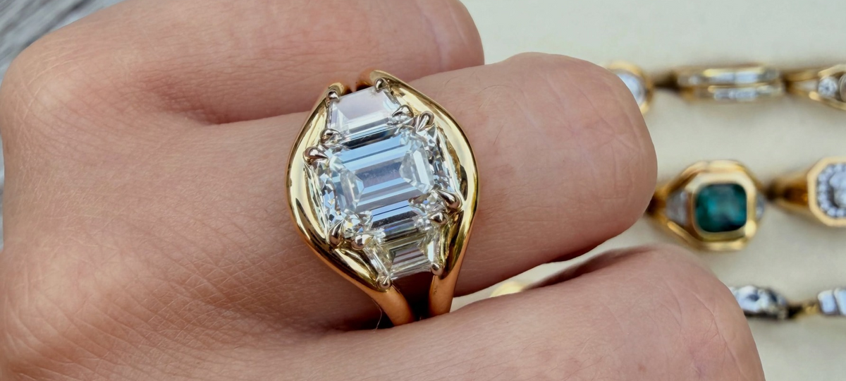 Cleaning a diamond engagement ring with warm water and a soft toothbrush