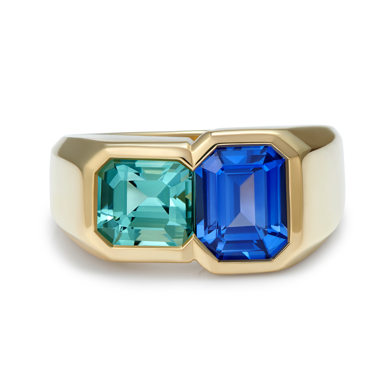 Toi et Moi style ring in 18k yellow gold featuring geometrically cut sapphire and tourmaline