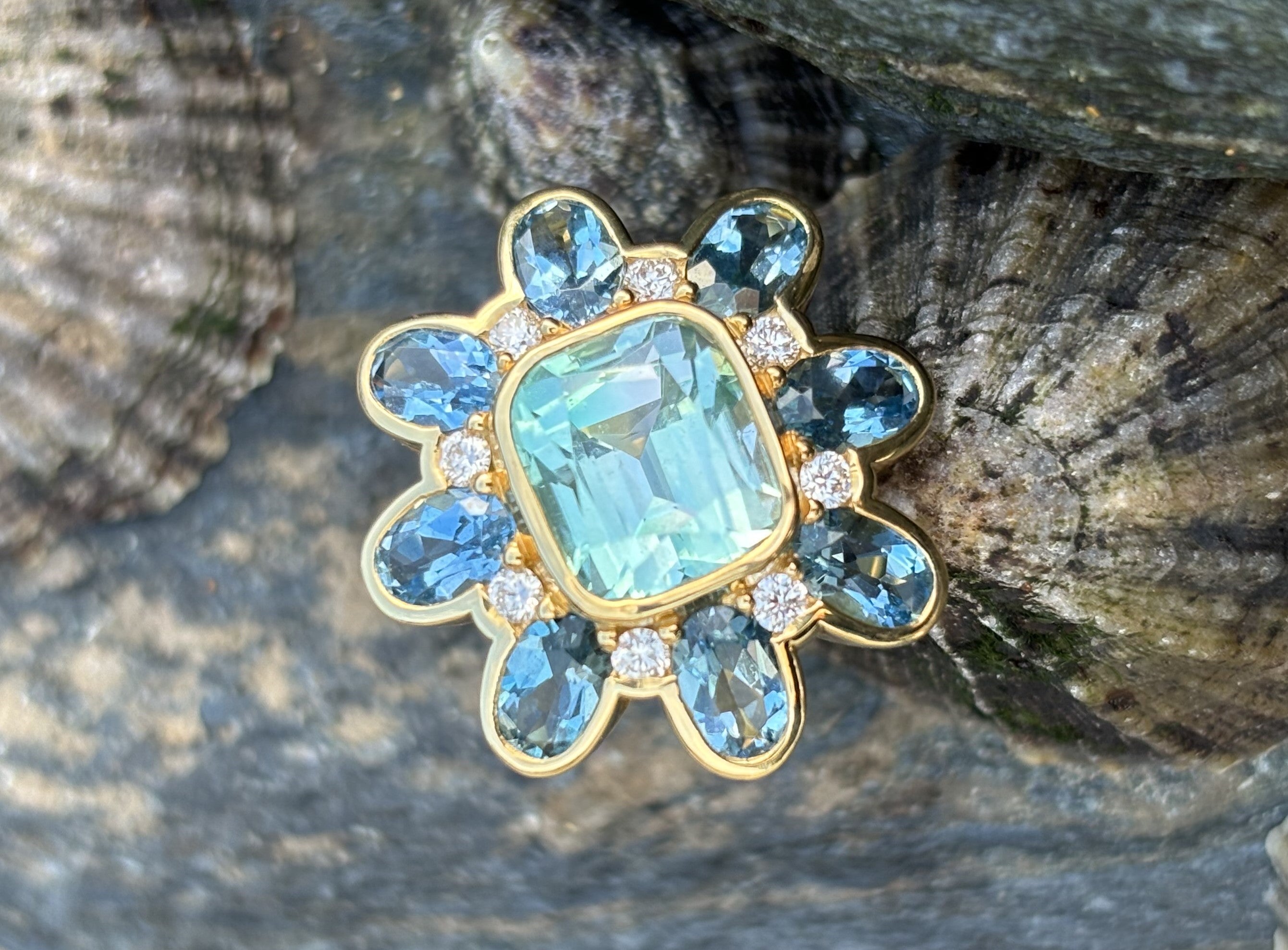 Cassandra Goad Gold ring flower large blue gemstone tourmaline diamond 