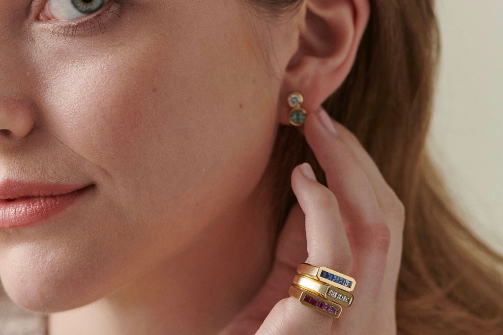 Cassandra Goad colorful pink, blue sapphire and diamonds gold geometric rings