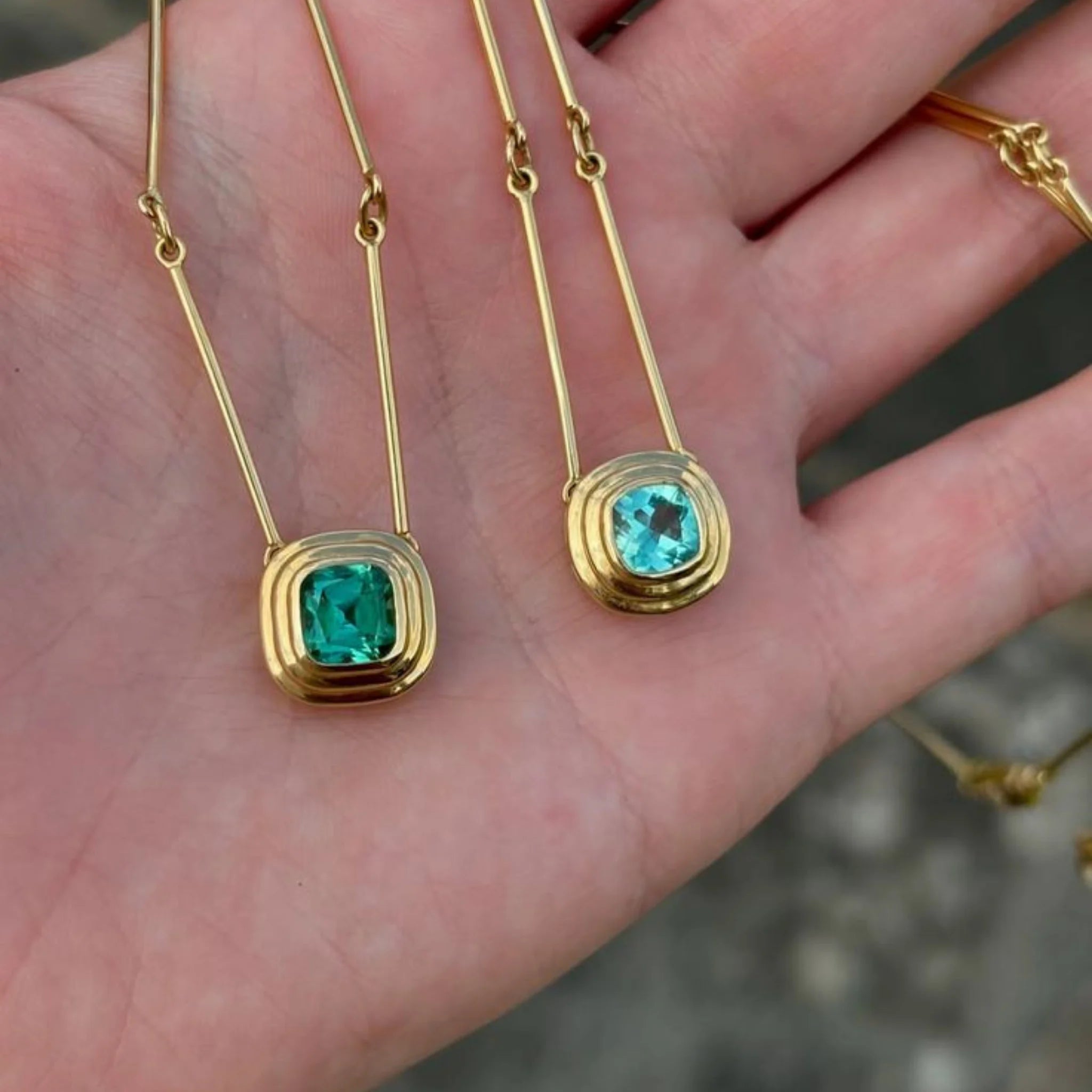 Close-up of Athena Collection 1ct mint green tourmaline necklace in 18k yellow gold with cushion-cut mint green tourmaline pendant