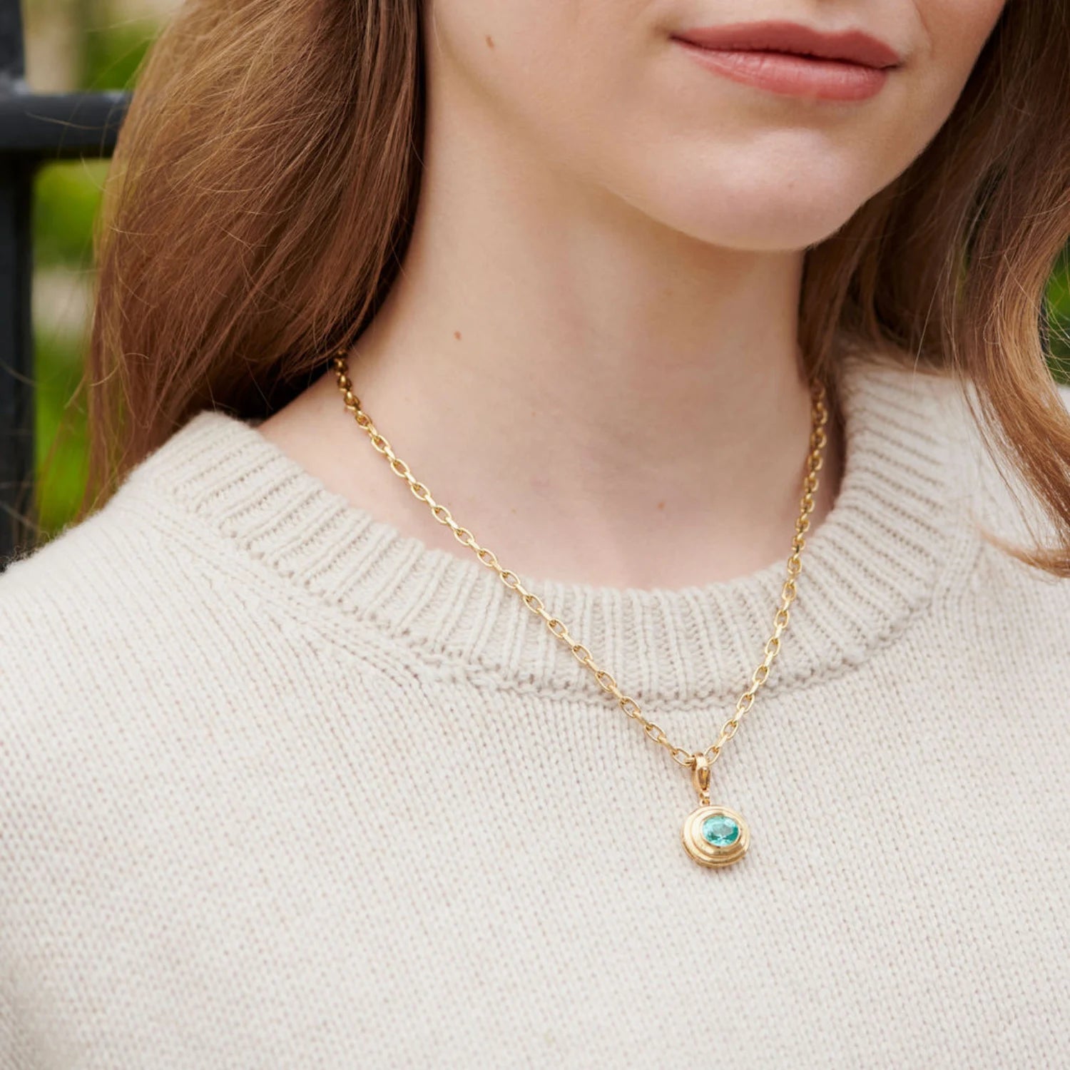 Model wearing Athena 2.93ct lagoon blue tourmaline pendant in 18k yellow gold with oval-cut gemstone on 4.5mm chunky chain