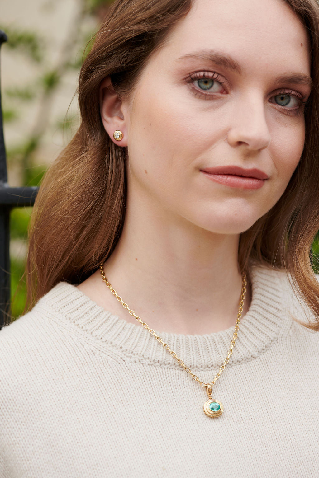 Model wearing Athena pendant with 2.93cts lagoon blue tourmaline on chunky chain necklace
