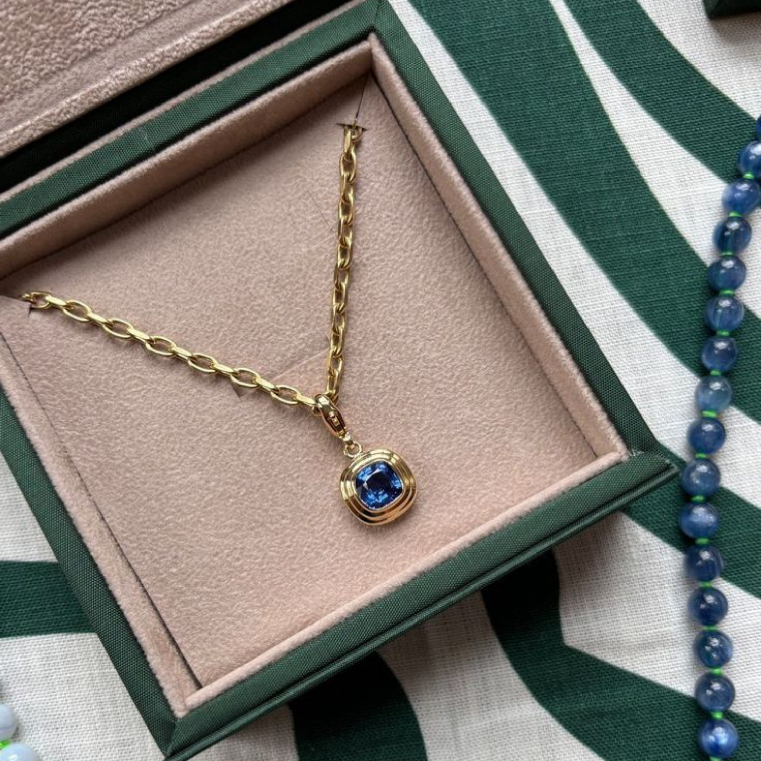 Athena 3.33ct sapphire necklace in 18k yellow gold featuring square cushion-cut cornflower blue sapphire pendant in minkajewels jewellery box