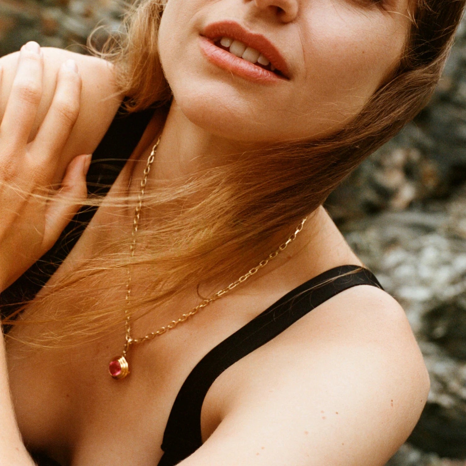 Model wearing Athena 18k yellow gold necklace with 4.50ct cushion-cut pink Tourmaline pendant on chunky chain