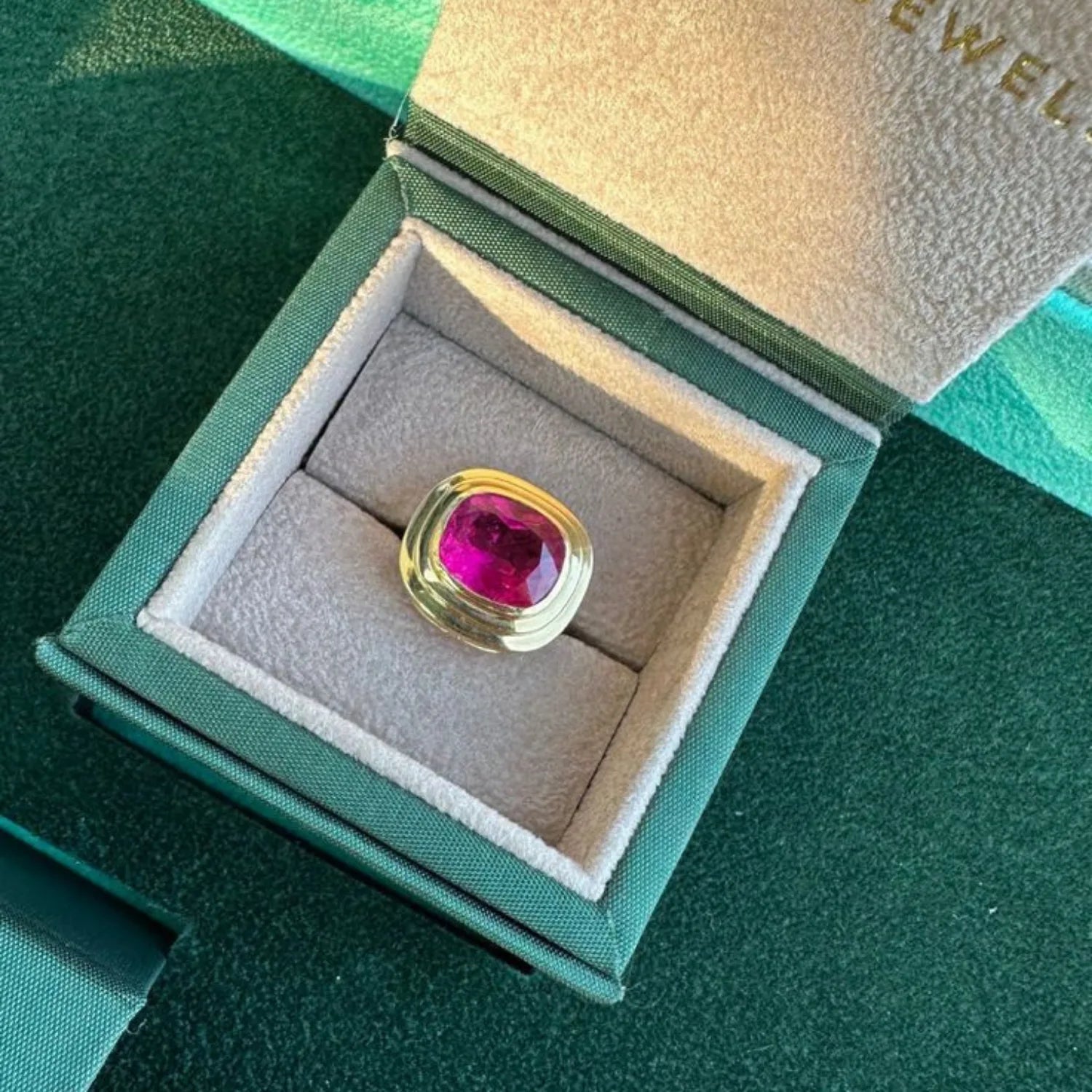 Athena 7.00ct pink tourmaline ring in 18k yellow gold showcasing large, vivid rubellite tourmaline in minkajewels jewellery box