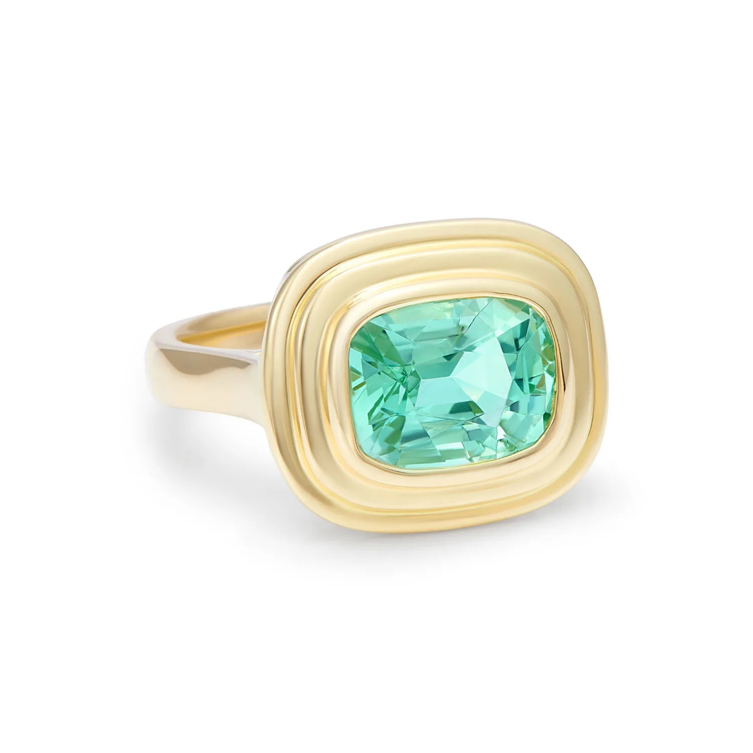 Side view of Athena electric blue tourmaline ring in 18k yellow gold showing sculptural setting inspired by classical Greek architecture