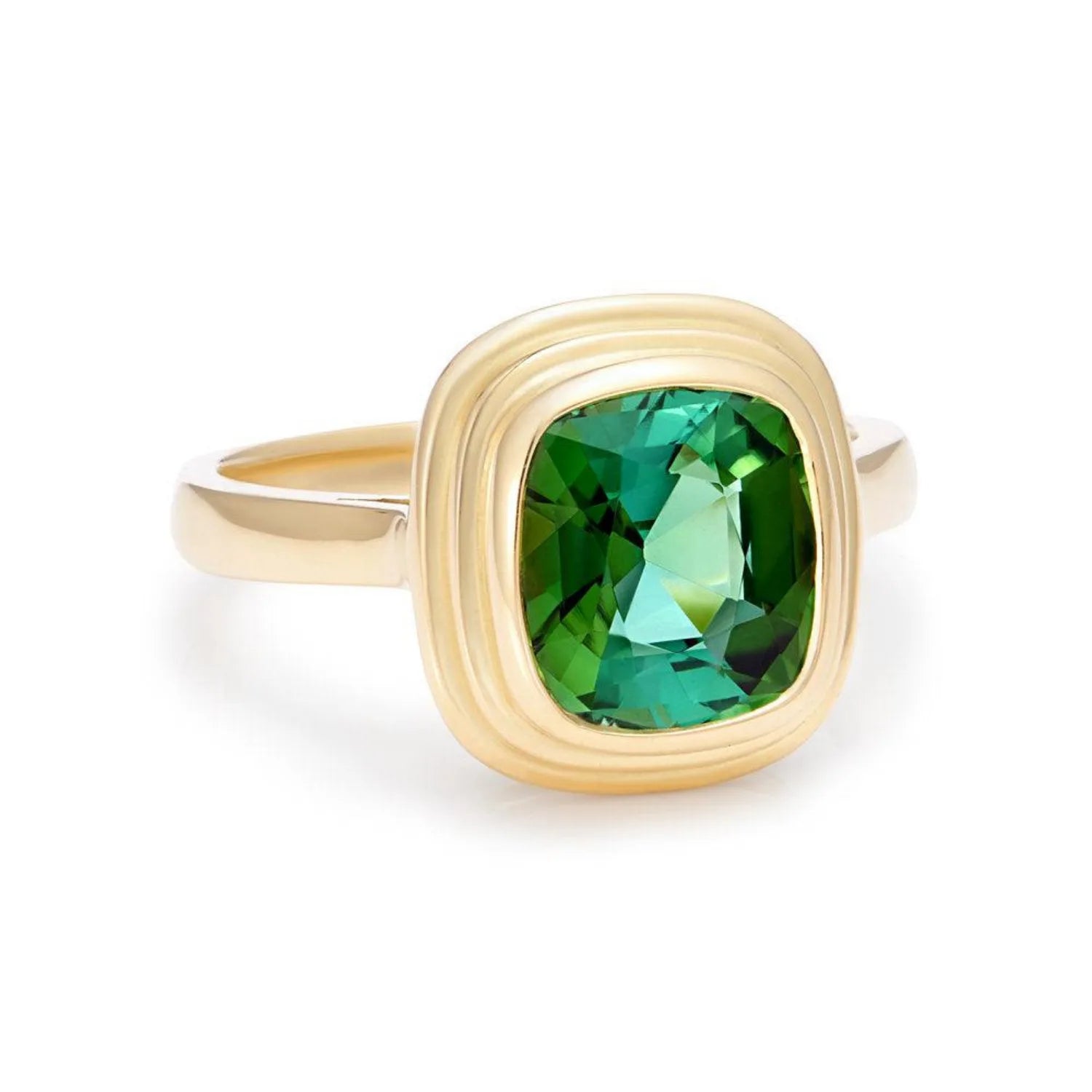 Side view of Athena green tourmaline ring in 18k yellow gold showing sculptural setting inspired by classical Greek architecture