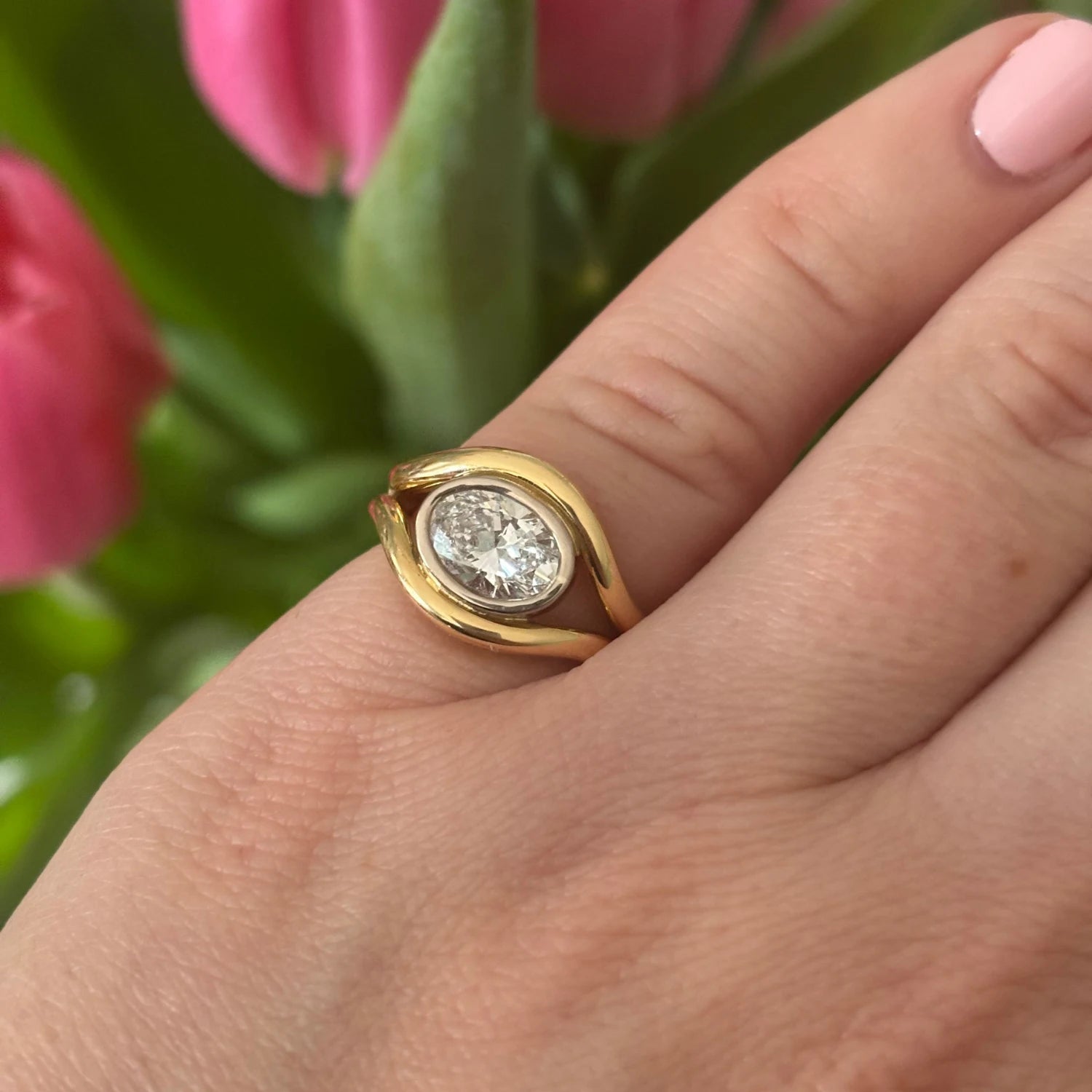 Close-up of Atlantis 1ct Diamond Mermaid Pinky Ring in yellow and white gold with 1ct oval-shaped lab-grown white diamond on mermaid tail-inspired band