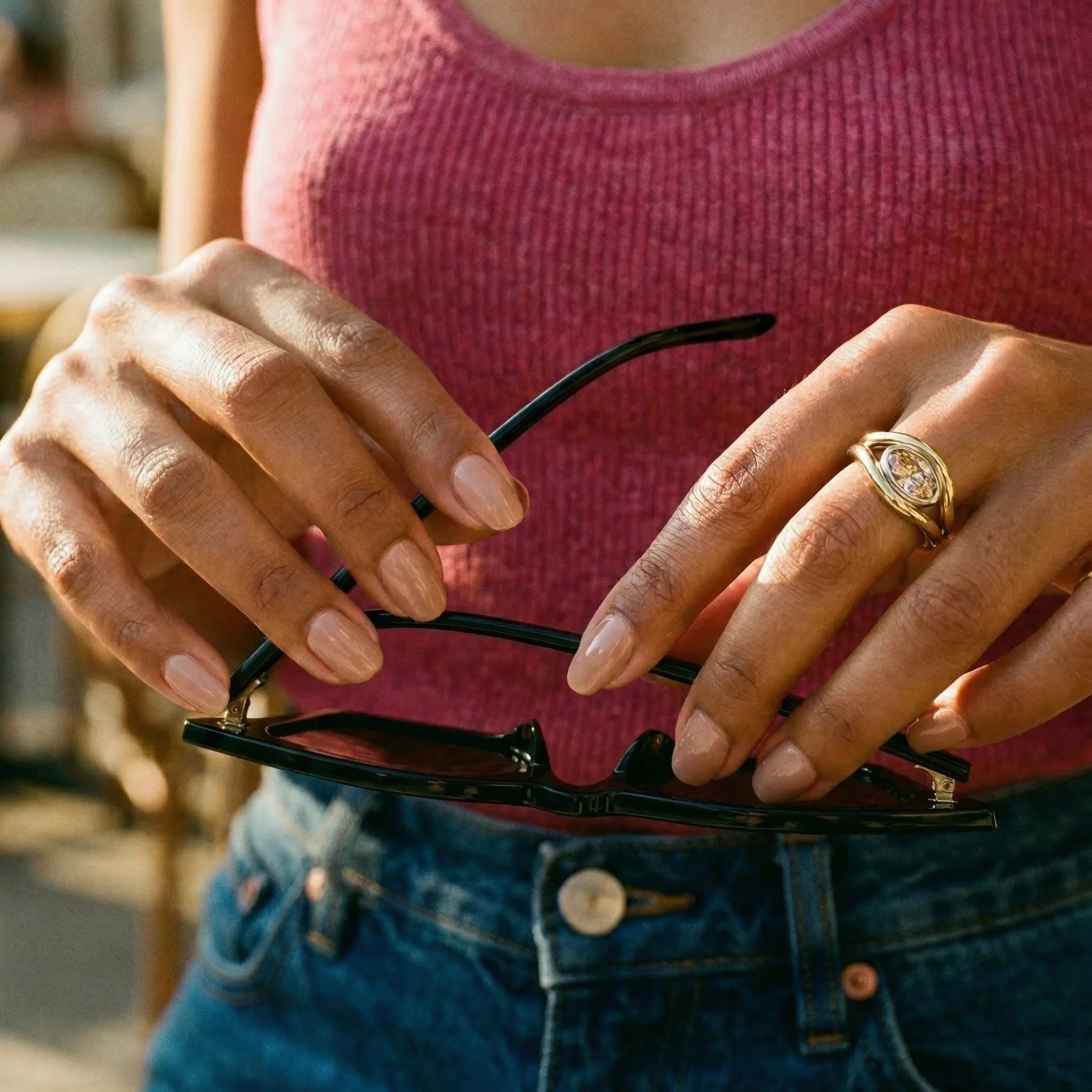 Model wearing Atlantis 2.04ct brown diamond mermaid ring in yellow and white gold with oval-shaped lab-grown brown diamond
