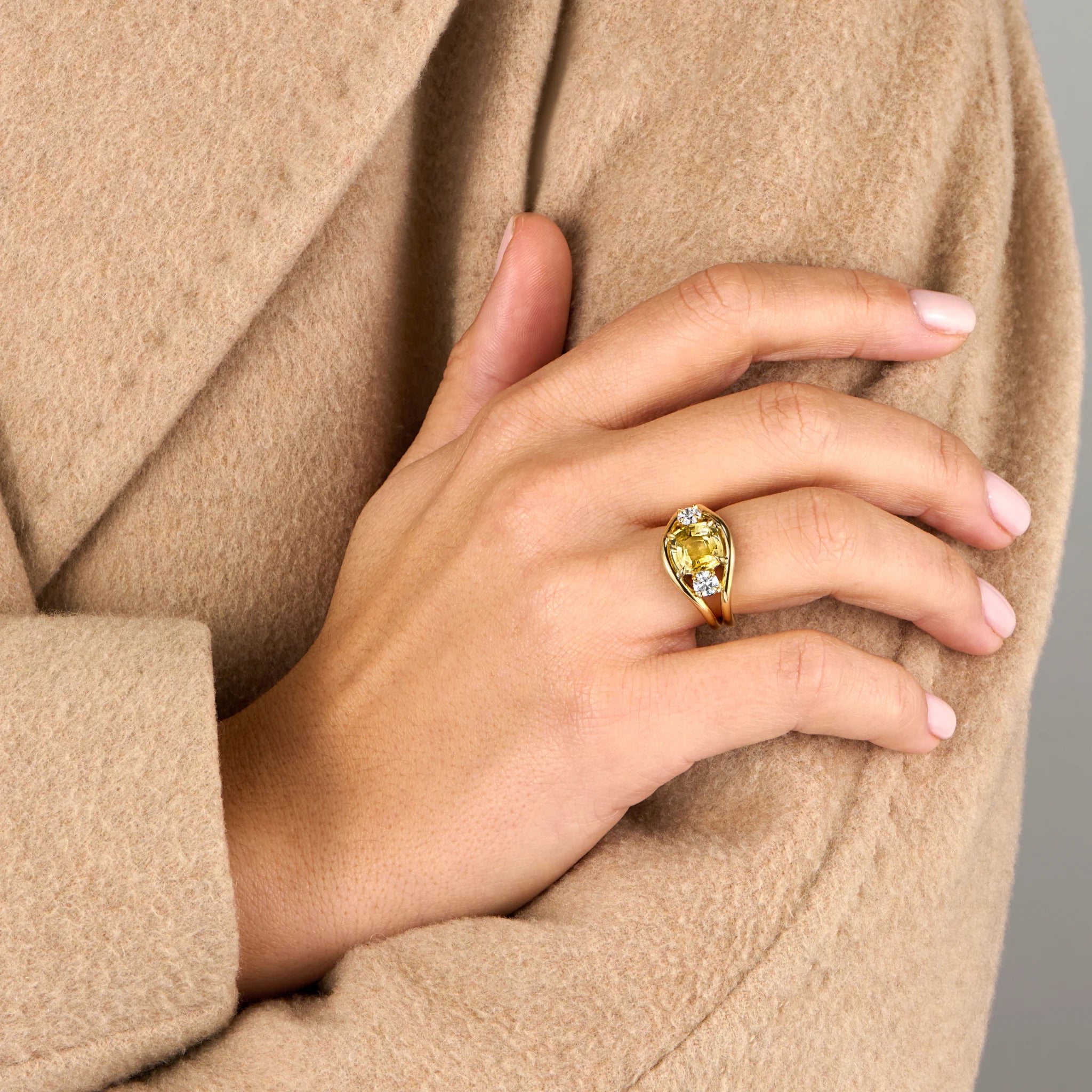 Close-up of Atlantis 2.95ct yellow sapphire mermaid ring in 18k yellow gold with square cushion-cut no-heat yellow sapphire and round white diamonds