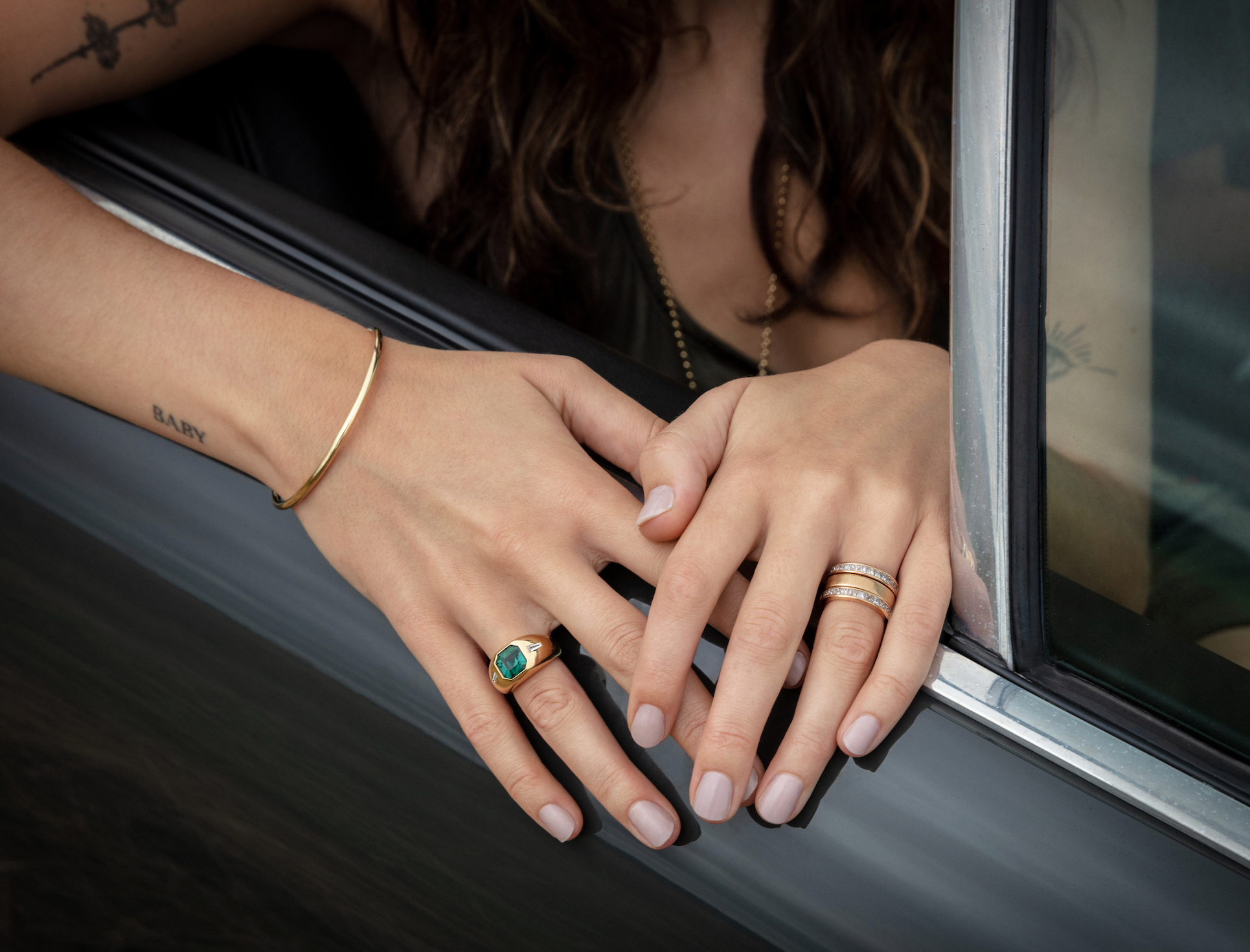 Close-up of wrist wearing Atlantis 2mm gold mermaid bracelet