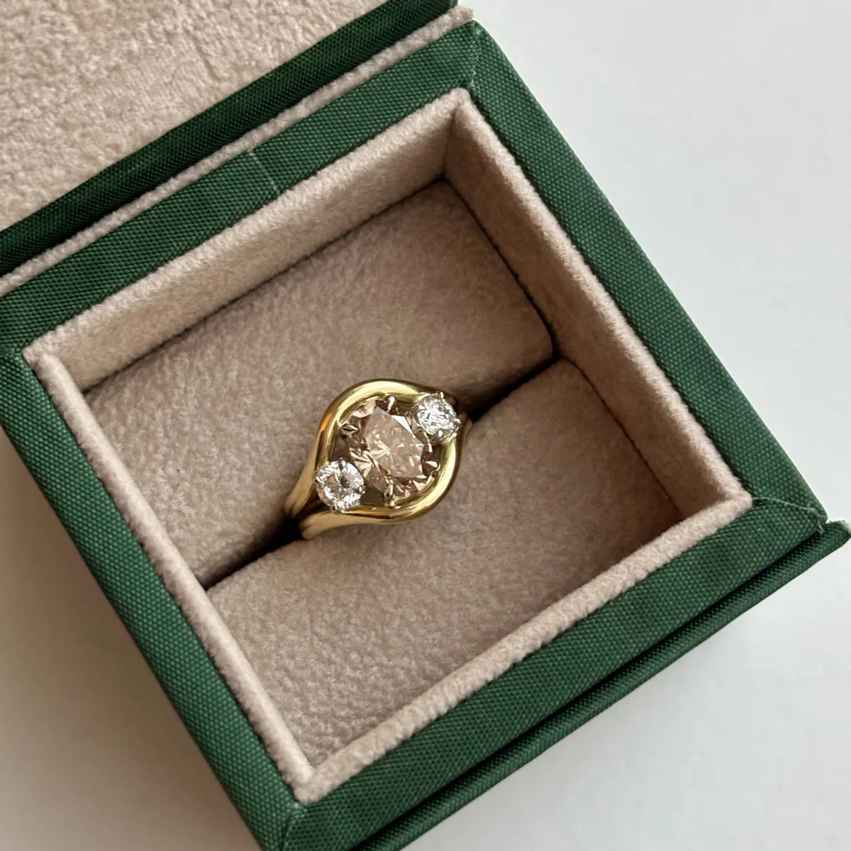 Close-up of Atlantis brown diamond mermaid ring in 18k yellow gold with square cushion-cut brown diamond and round white diamonds