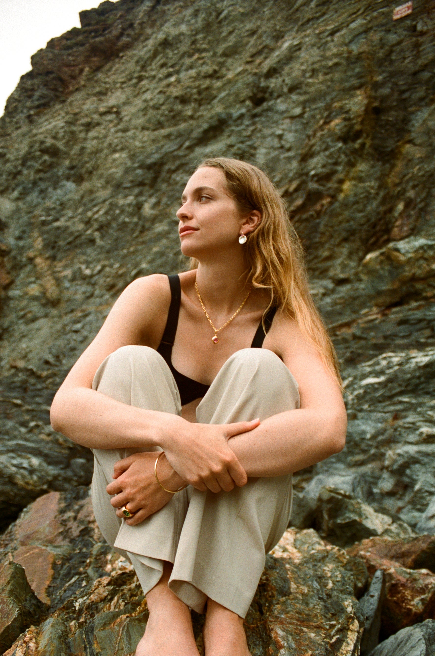 Atlantis sapphire and keshi pearl earrings worn by model