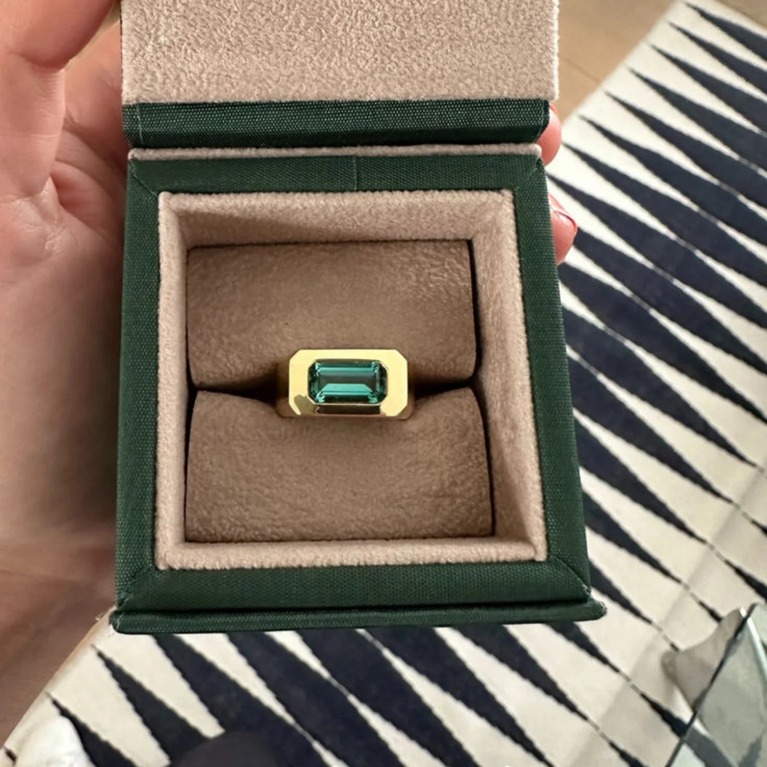 Close-up of Berlin Deep Green Tourmaline Ring showing 2.5ct octagonal-cut green tourmaline in 18k gold band inside the minkajewels jewellery box