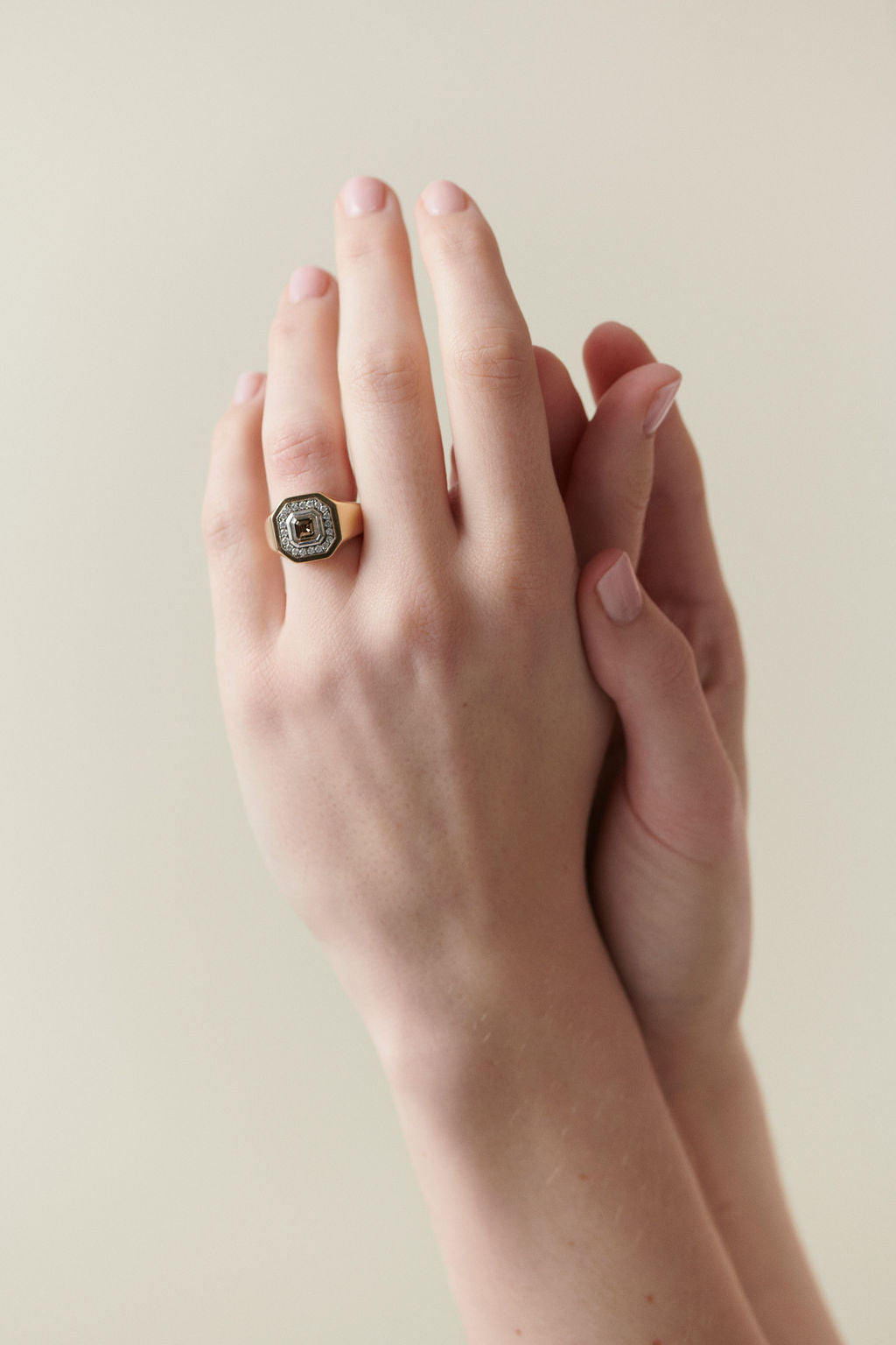 Close-up of hand wearing Berlin Nights 1.24ct cognac brown diamond ring