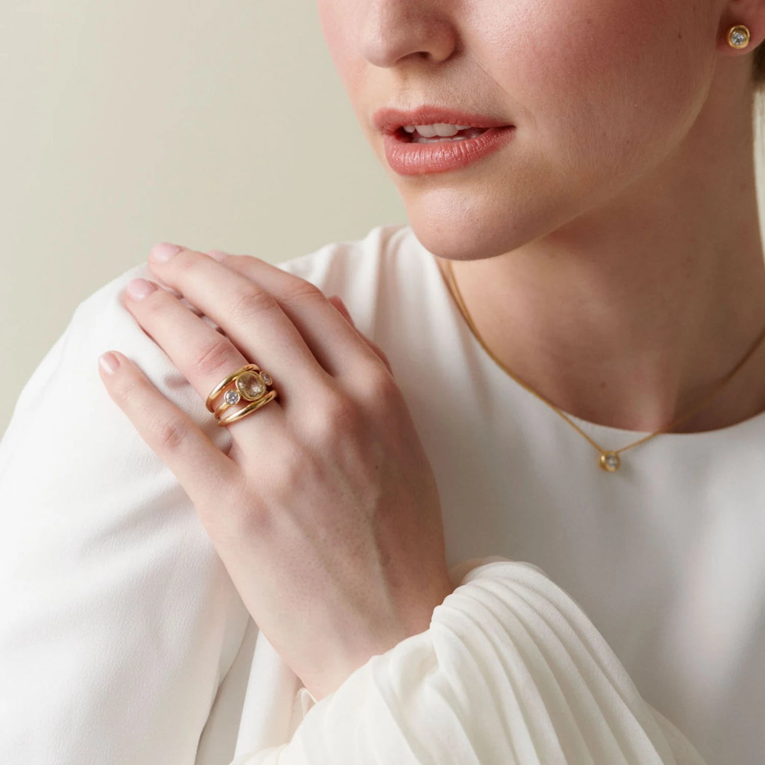 Model wearing Les Trois Vallées yellow sapphire and diamond ring in 18k yellow gold with 3.08ct cushion-cut no-heat Sri Lankan yellow sapphire and 0.50ct diamonds