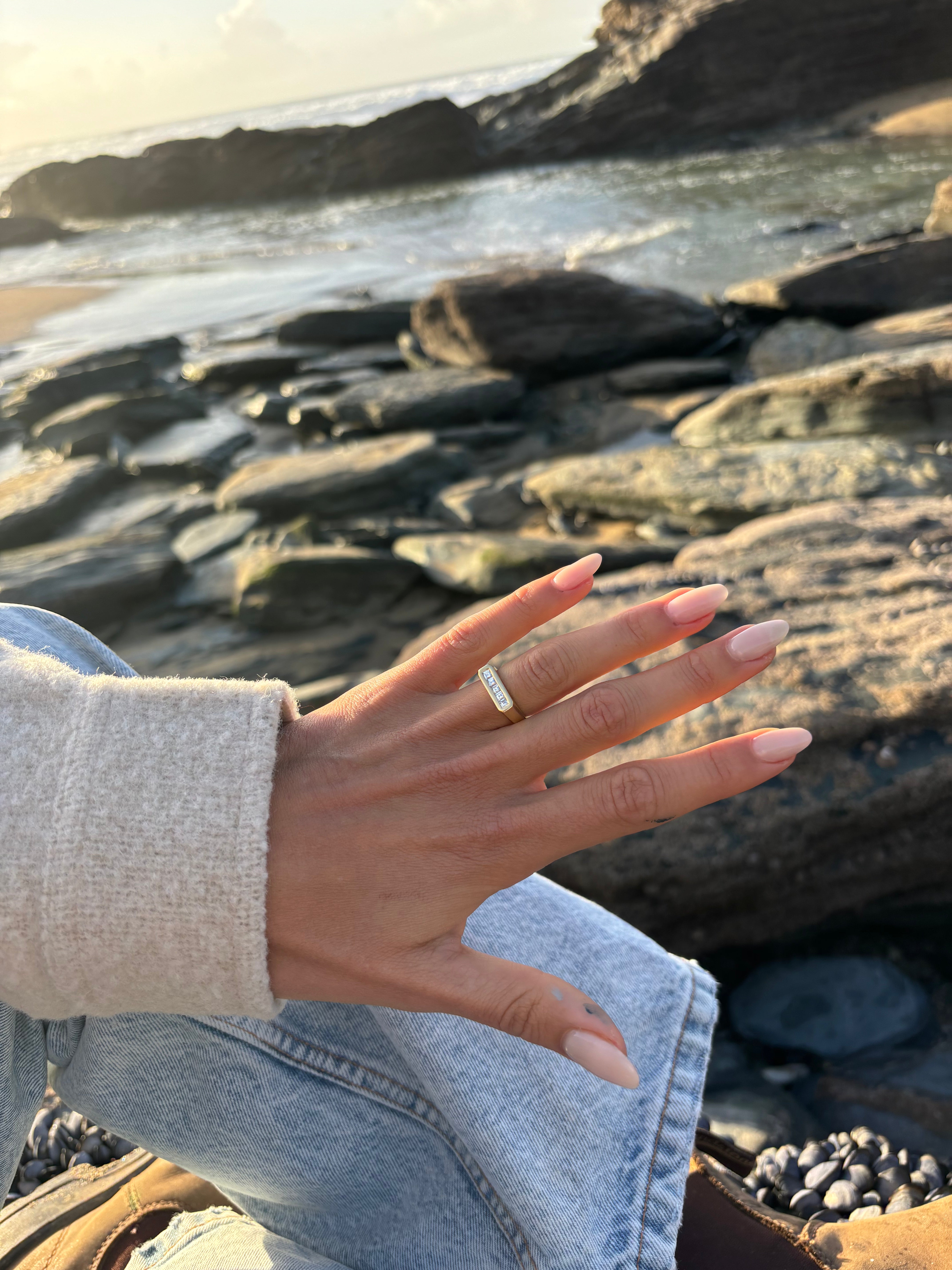 Hand model wearing Minka Jewels Ley Line Diamond Pinky Ring.