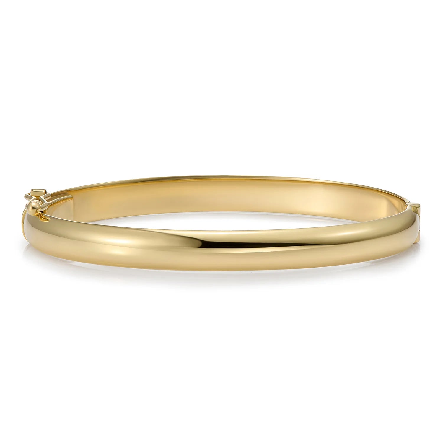 Ley Lines solid gold bangle bracelet in 18k yellow gold with a smooth polished finish