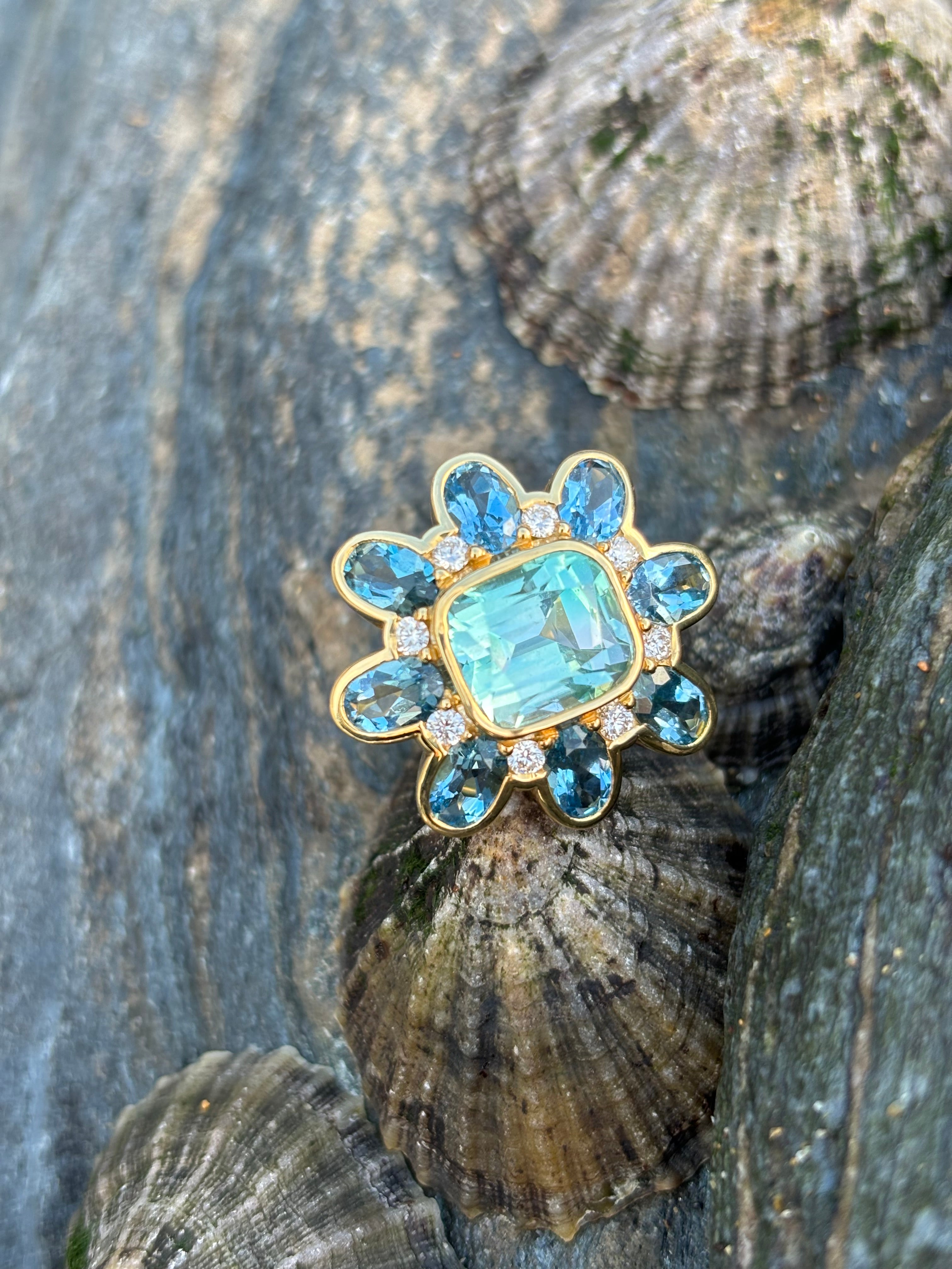 Cassandra Goad Gold ring flower large blue gemstone tourmaline diamond 