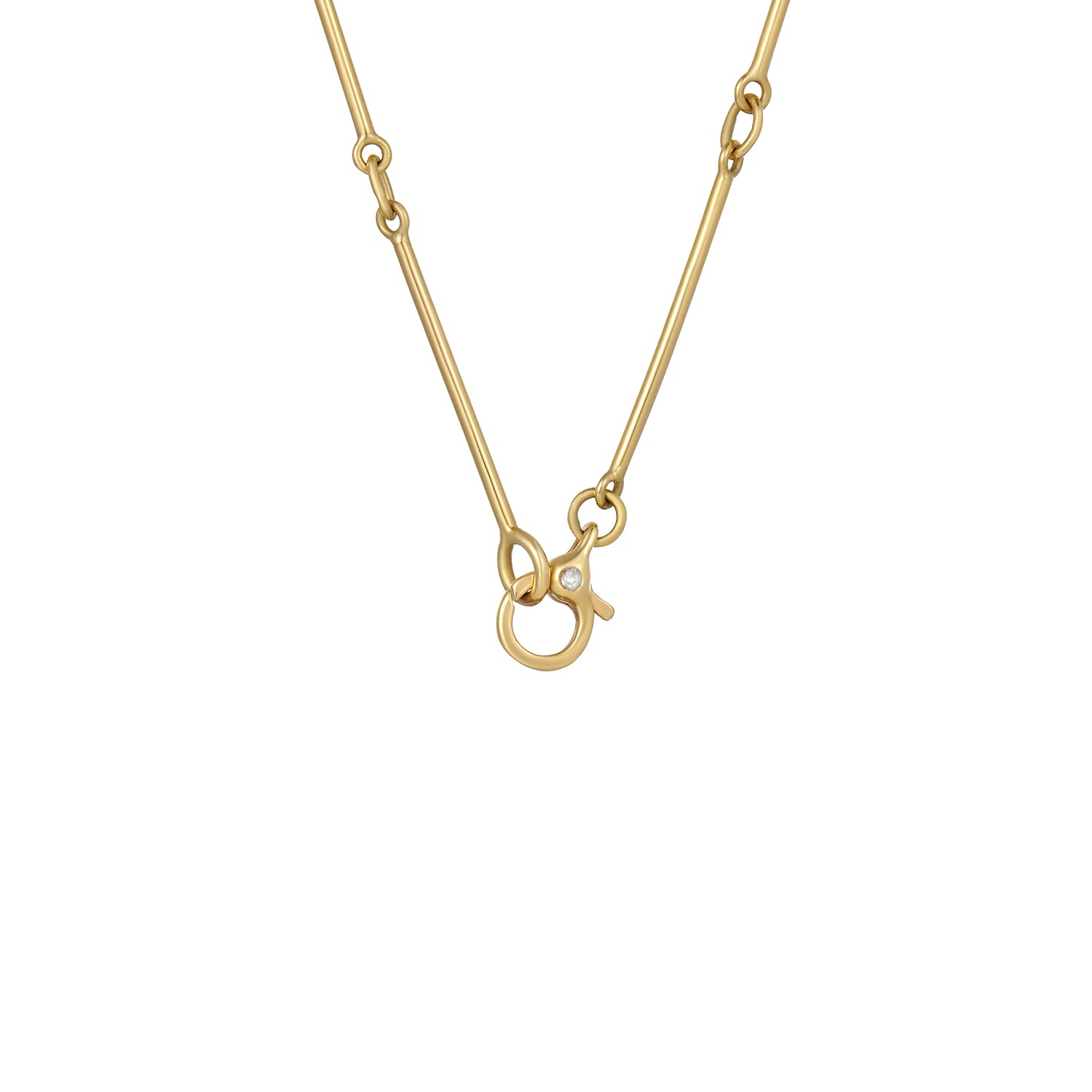 Close-up of 18k yellow gold bar chain clasp lock showing secure fastening mechanism and polished finish
